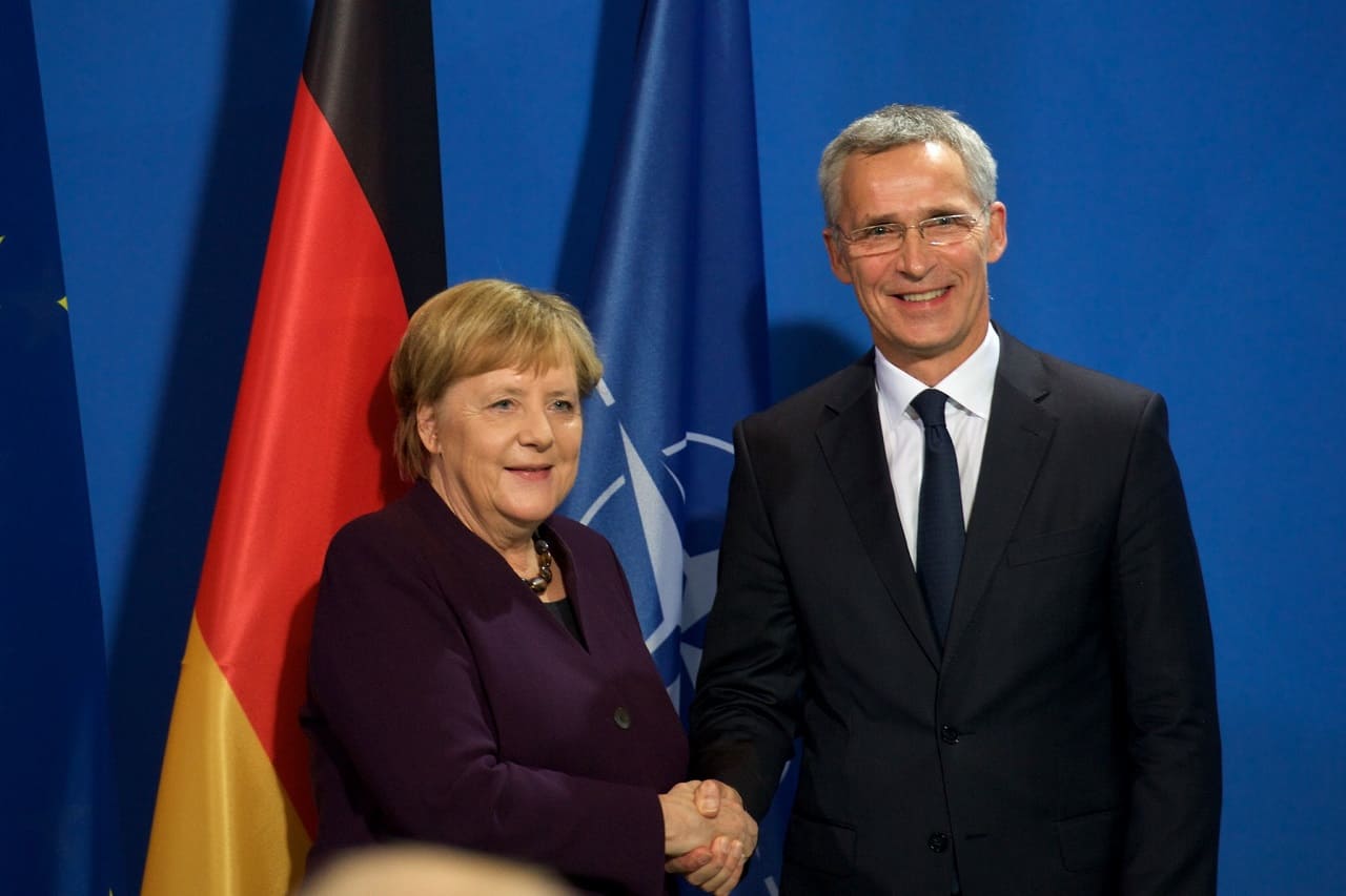 Jens-Stoltenberg-NATO-Chancellor-Angela-Merkel-Kritisches-Netzwerk-Buendnispartner-Uebernahme-von-Verantwortung-westliche-Wertegemeinschaft-Rektalvisite