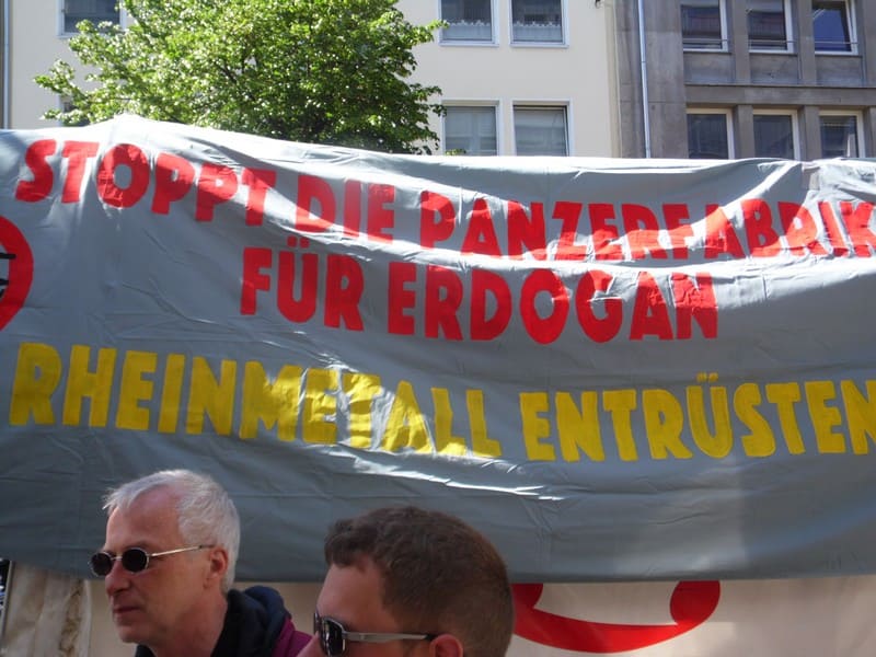 Rheinmetall-entwaffnen-entruesten-Camp-Krauss-Maffei-Wegmann-Waffenembargo-Kritisches-Netzwerk-Waffenexporte-Waffenindustrie-Ruestungsexporte-Ruestungskonzerne